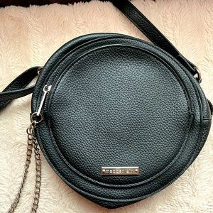 Round black and silver Madden Girl Purse